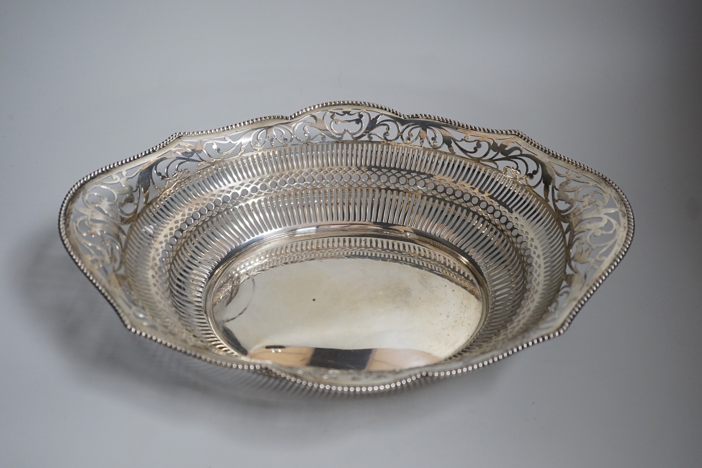 A early 20th century Dutch pierced white metal cake basket, 33.7cm, 16.5oz.